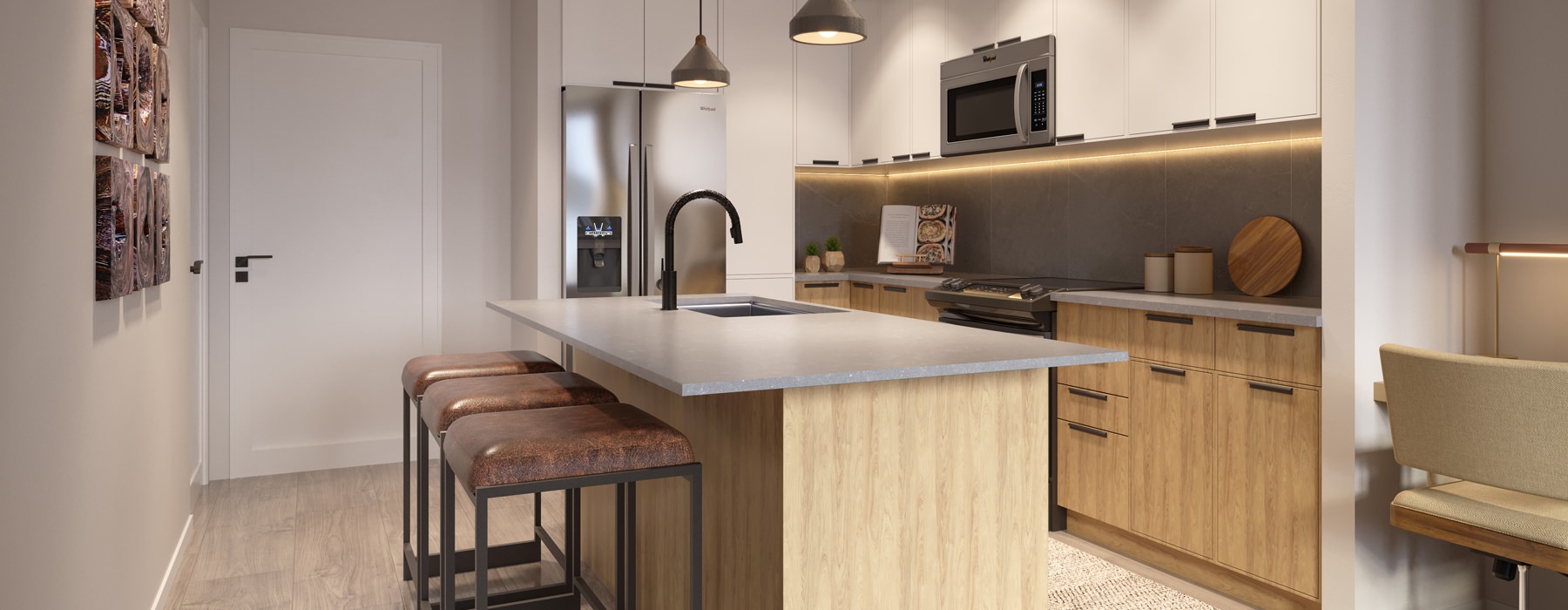 kitchen with an island and bar stools