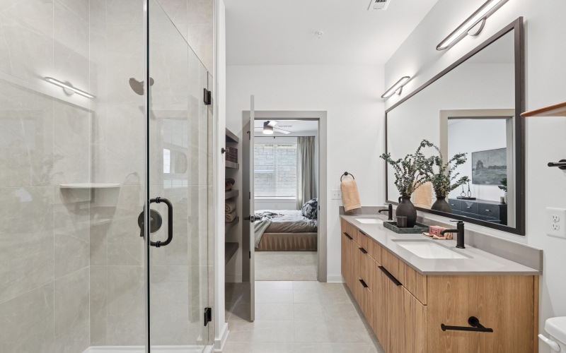 Glass-enclosed shower or soaking tub—your choice of indulgence